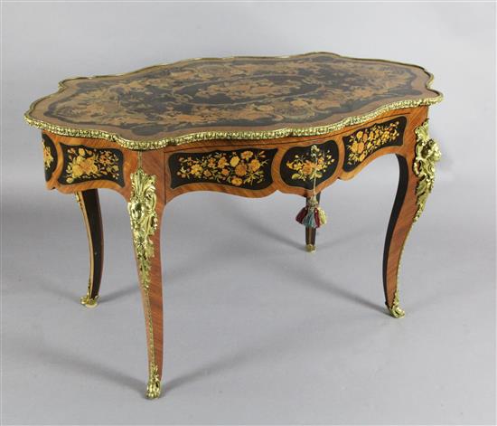 A French ormolu mounted marquetry and kingwood centre table, W.4ft 2in. D.2ft 6in. H.2ft 6in.